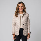 Women's quilted jacket with a collar and long sleeves by Ivy & Co, image 1 of 4