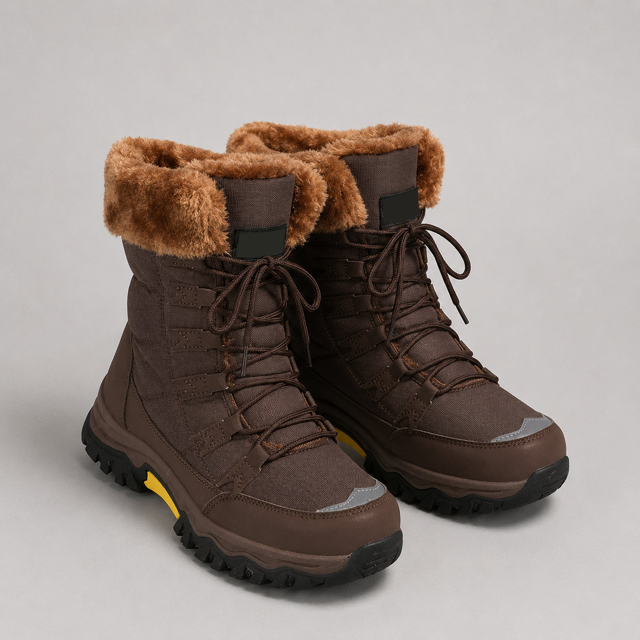 Women's lace-up winter boots with a faux fur trim by Ivy & Co, image 1 of 3